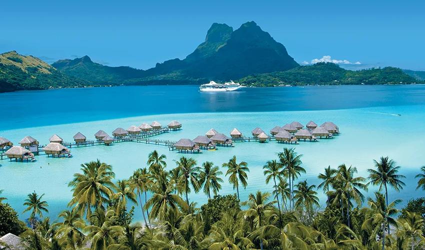 Bora Bora Overwater Bungalows, trees at bottom, from PG press site